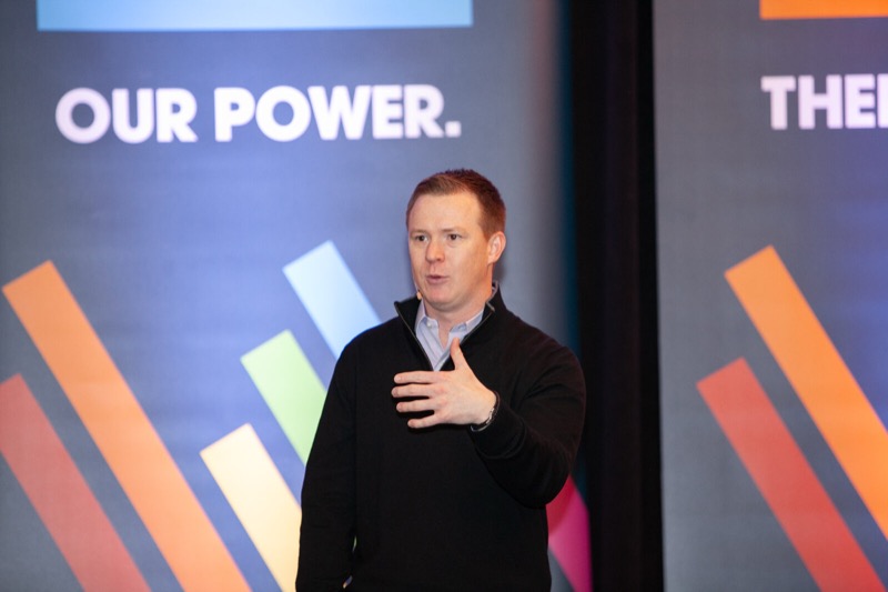 Curt presenting on stage